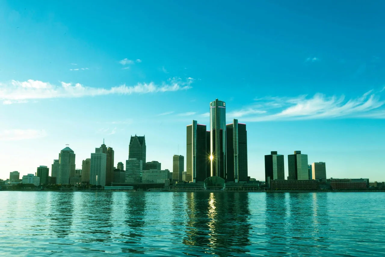 The skyline of New Jersey is reflected in a lake. The skyline of New Jersey is reflected in a lake.