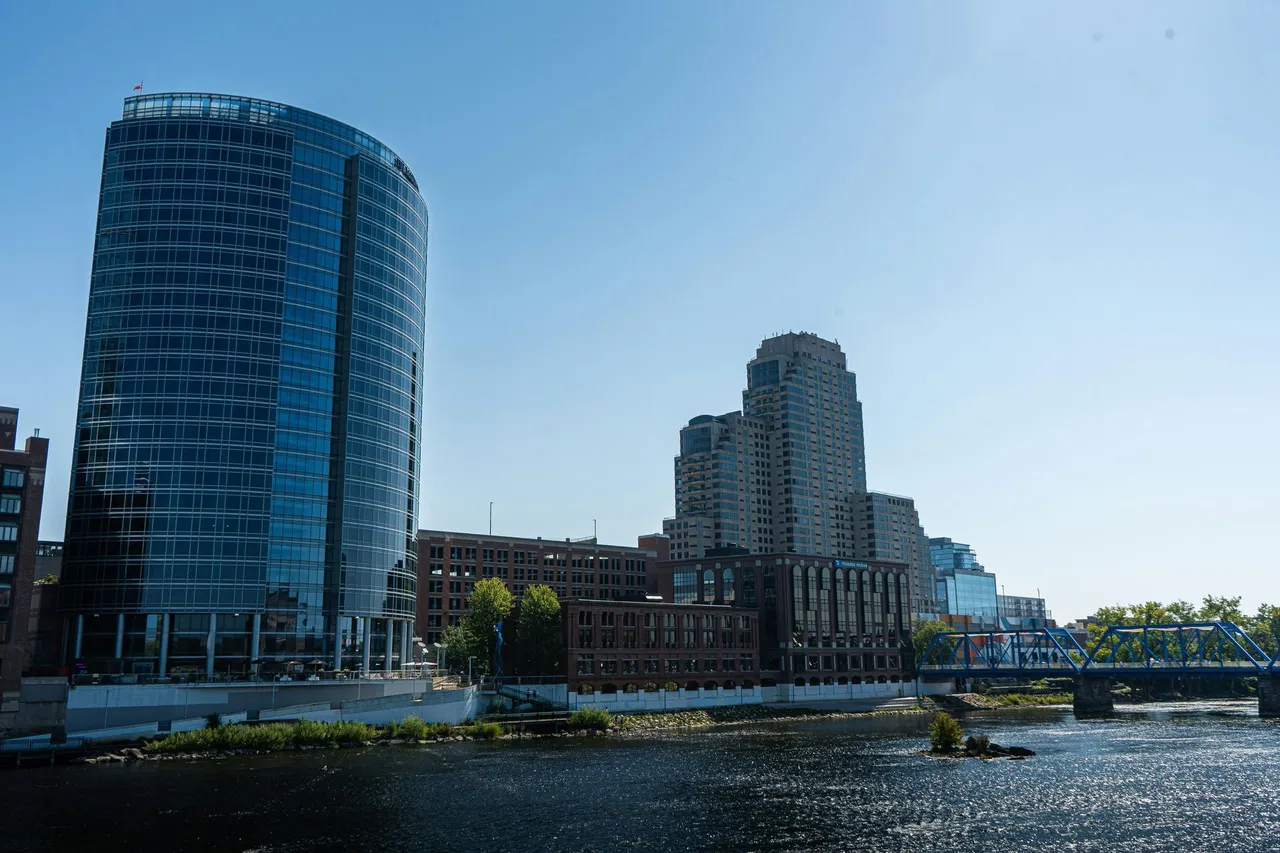 The skyline of New Jersey is reflected in a lake. The skyline of New Jersey is reflected in a lake.