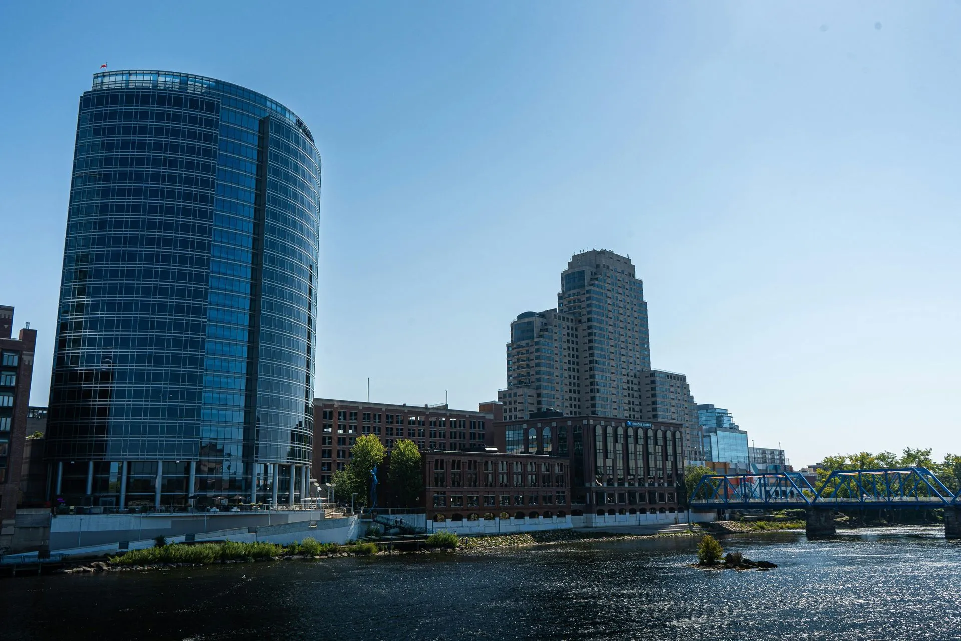 The skyline of New Jersey is reflected in a lake. The skyline of New Jersey is reflected in a lake.